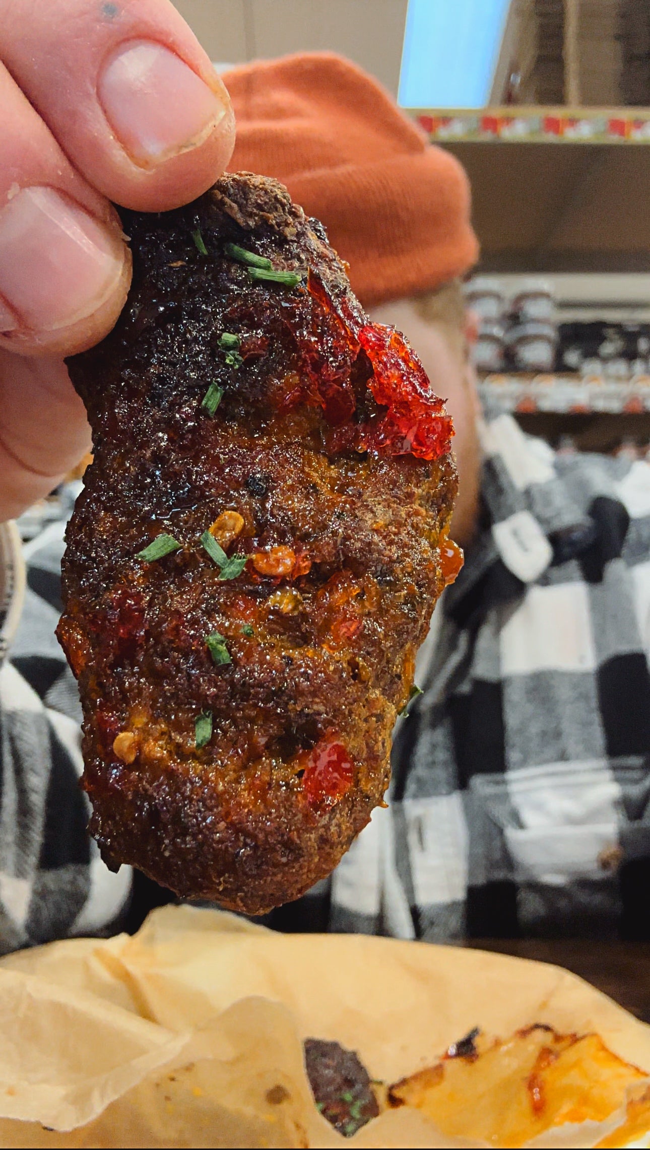 Delicious hunk of meat holding a delicious hunk of meat